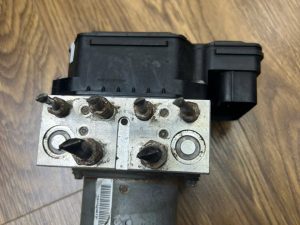 CỤM ABS MAZDA CX9 TK21437A0